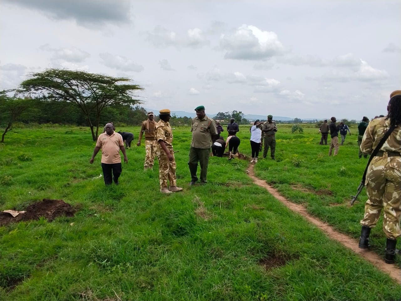 TCCN members, partners and participants take part in a tree growing activity at Naivasha Medium Prison.