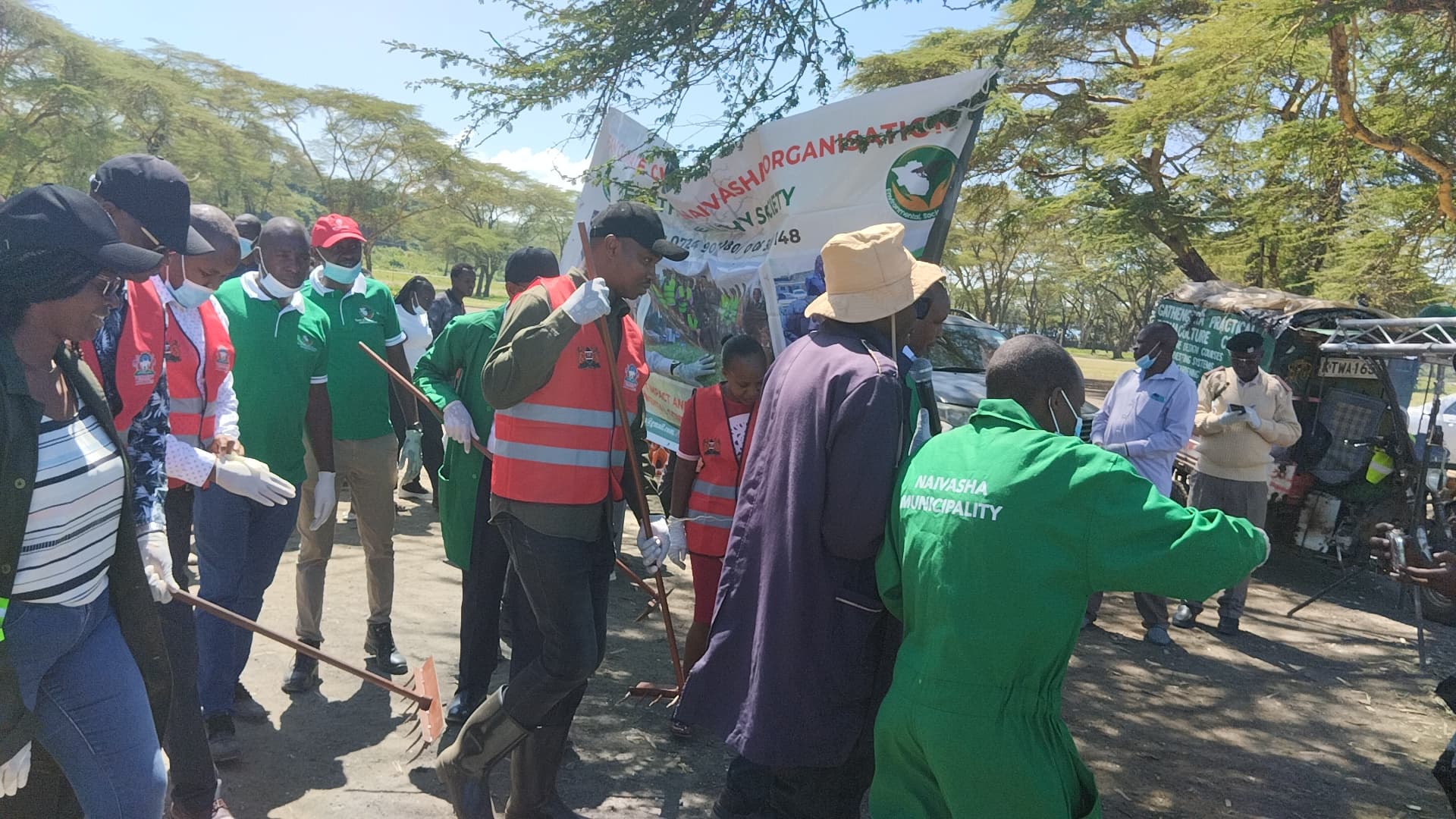 Community members take part in a clean-up activity around Lake Naivasha to help protect the lake and its surrounding environment.
