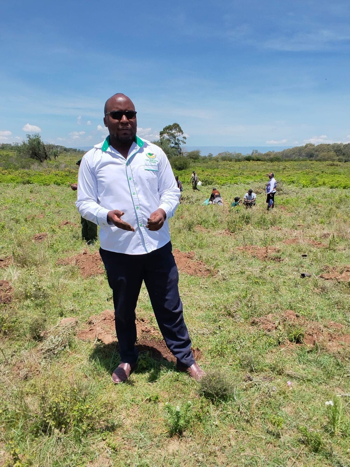 Portrait photograph of Clevin Ombasa, Organizing Secretary of Team Climate Change Naivasha.